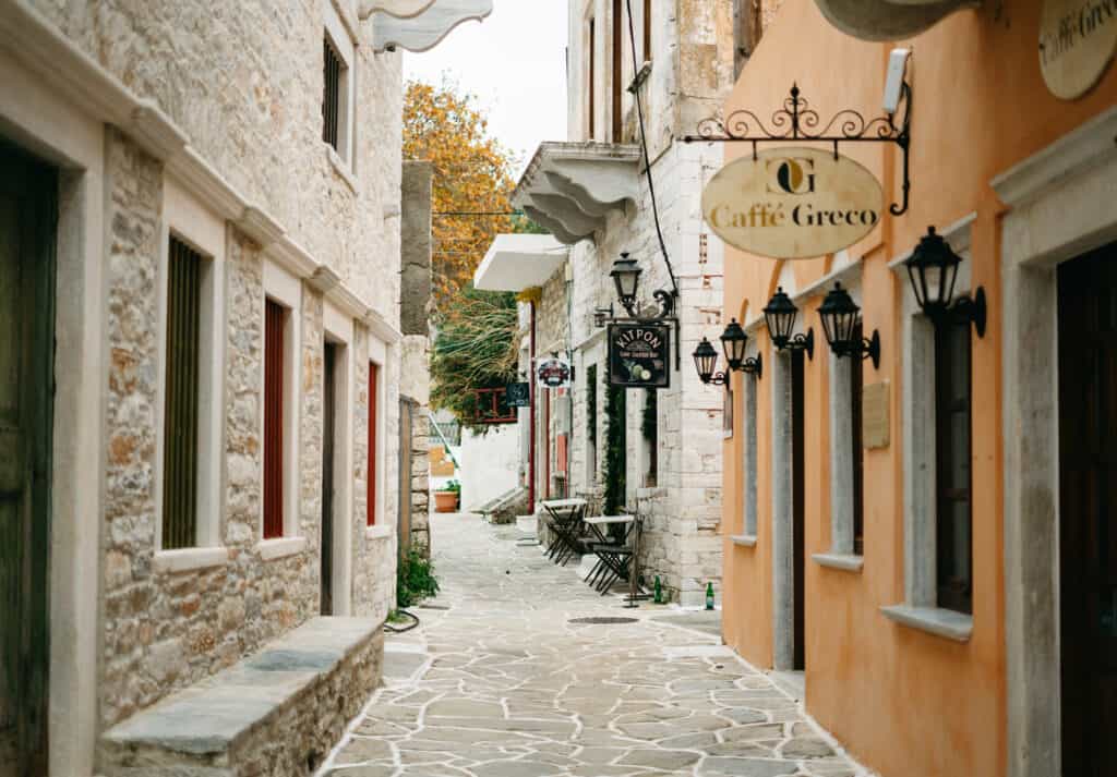 walking through a narrow street in Chalki, Naxos