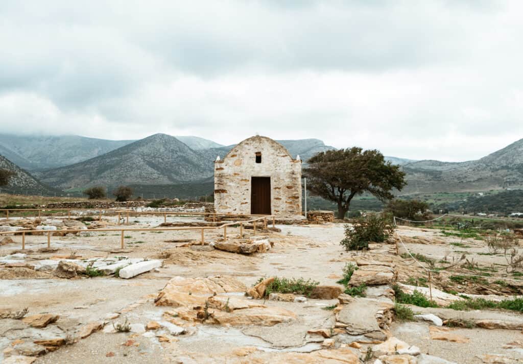 a part of the temple in the mountains of Naxos, Greece. There are many ruins surrounding the building