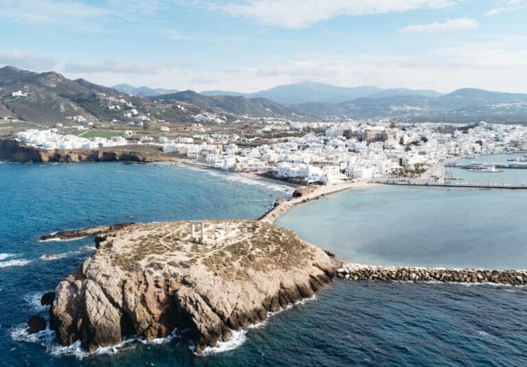 drone view of Portara and Temple of Apollo near Naxos Port in Naxos, Greece