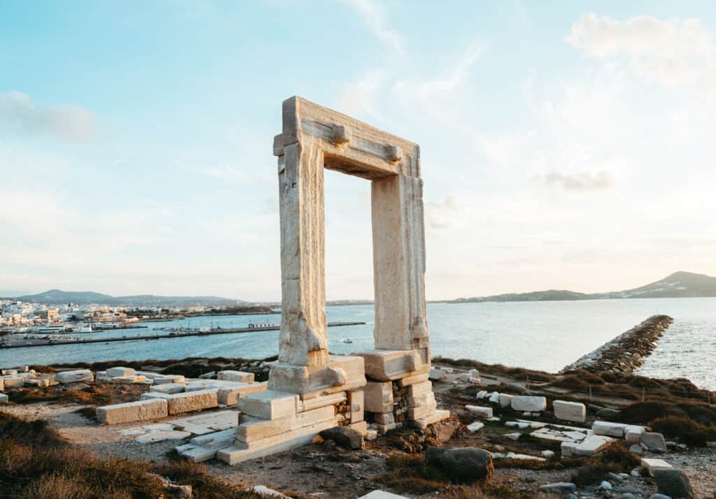 Portara or Temple of Apollo in Naxos, Greece. You can see Naxos Port and the ocean in the background
