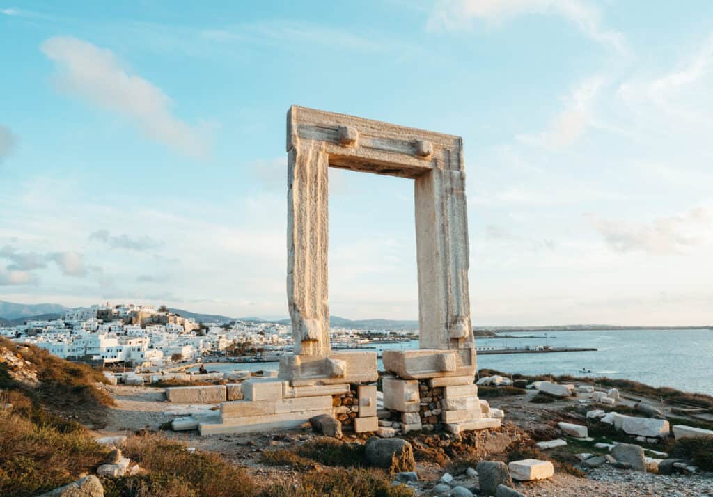 Portara or Temple of Apollo in Naxos, Greece. You can see Naxos Port and the ocean in the background